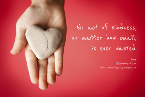 No act of kindness, no matter how small, is ever wasted. Hand holding a stone heart.
